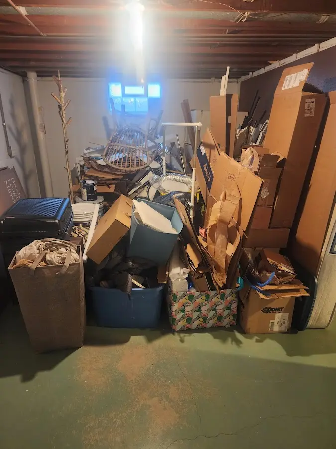 Roll-off dumpster container at job site for Concrete Dumpster Rental in Longwood